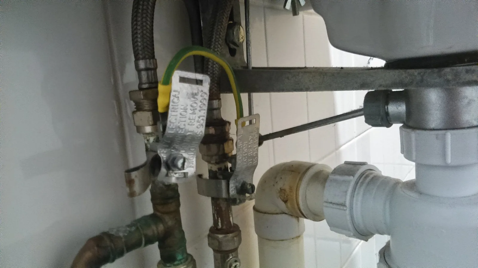 Pipework under a sink